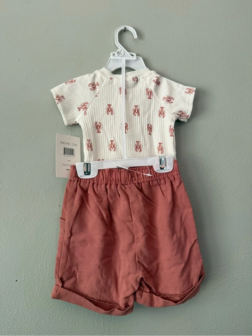 Rachel Zoe Baby Cream Onesie with Rust Lobster Print